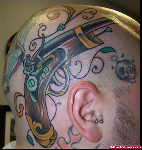 Traditional Gun Tattoo On Head