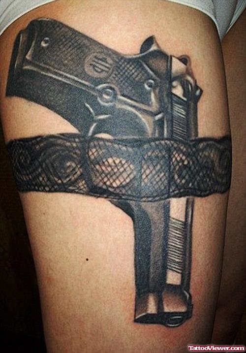 Amazing Black Gun Tattoo On Thigh