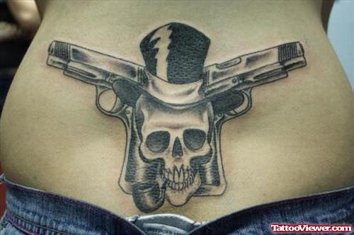 Skull With Hat and Gun Tattoos On Lowerback