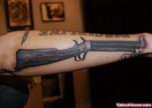 Shot Gun Tattoo On Sleeve