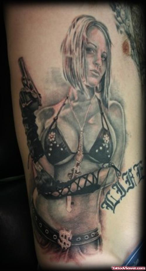 Pinup Girl With Gun Tattoo