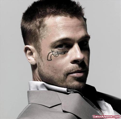 Brad Pitt Gun Tattoo Under Right Eye