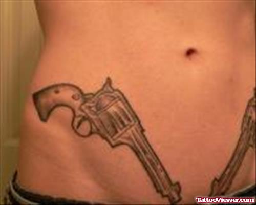 Large Gun Tattoo On Hip