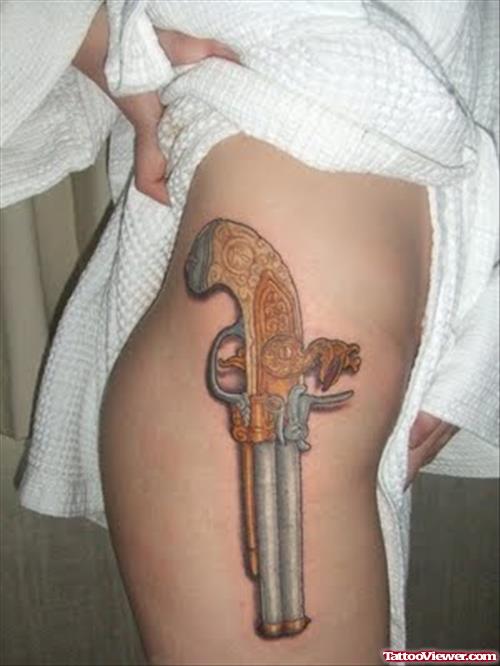 Colored Gun Tattoo On Side