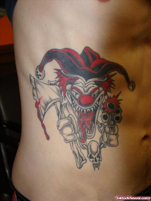 Colored Clown With Axe And Gun Tattoo On Side Rib