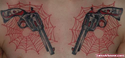 Spider Webs And Pistol Tattoos On Man Chest