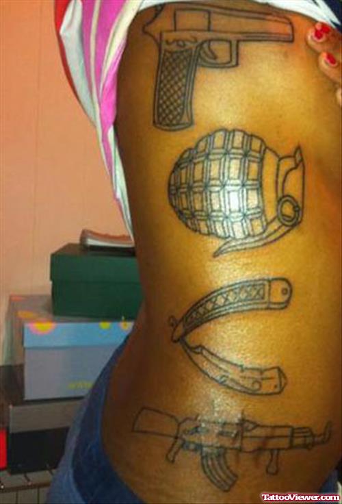 Love Gun Tattoo On Girl Side Rib