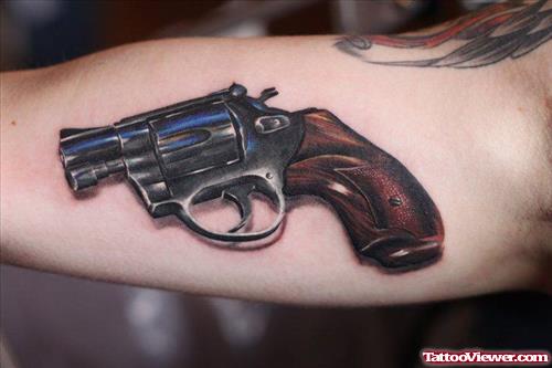 Gun Tattoo On Muscles