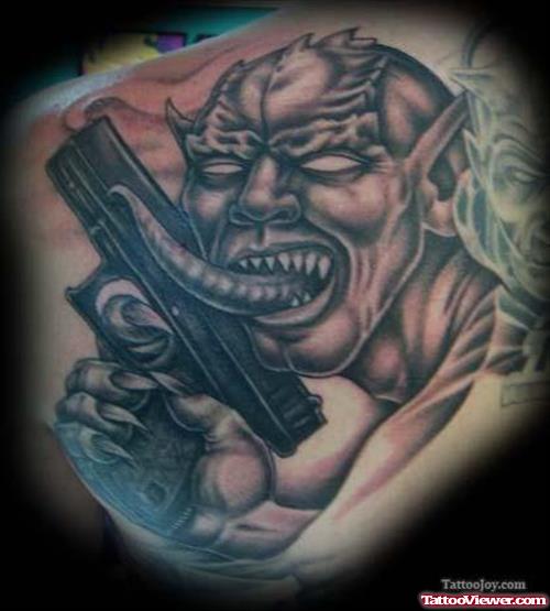 Demon With Gun Tattoo
