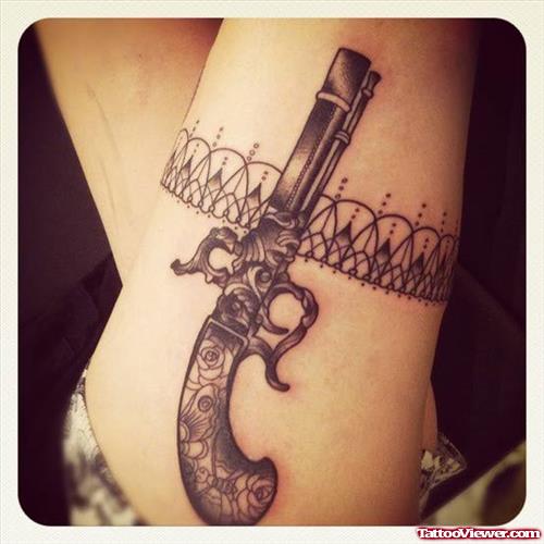 Beautiful Grey Ink Gun Tattoo On Right Thigh