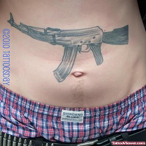 Ak 47 Gun Tattoo On Belly