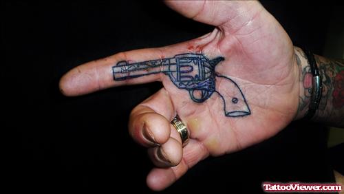 Small Gun Tattoo Inside Hand