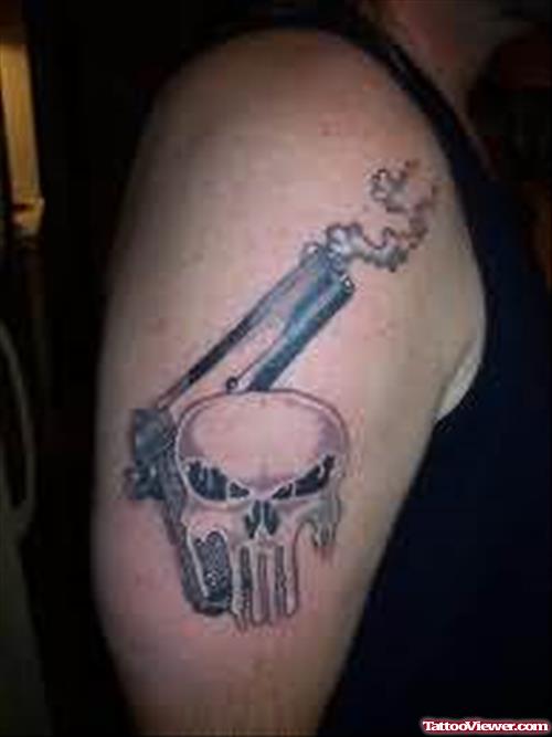 Skull And Gun Tattoo On Men Shoulder