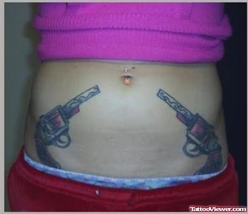 Gun tattoos on Girls Belly
