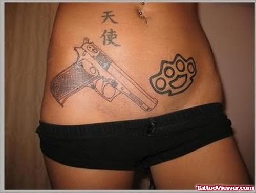 Chinese Gun Tattoo On Stomach