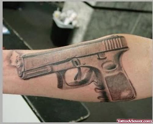 Shooting Gun Tattoo On Arm