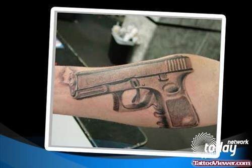 Bold Gun Tattoo
