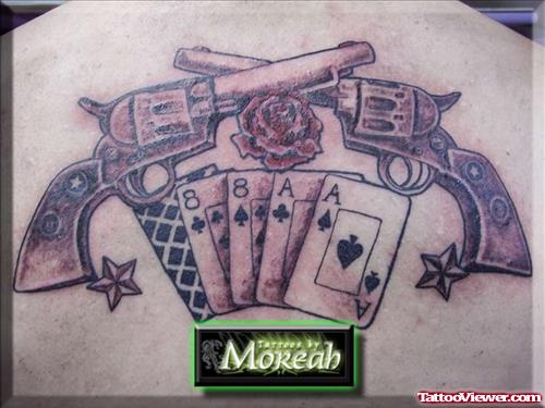 Cards And Gun Tattoo On Back