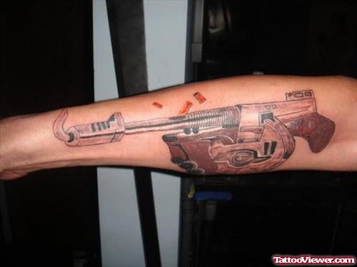 Big Gun Tattoo For Arm