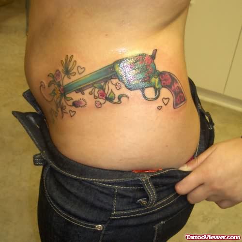 Gun Tattoo On Rib For Girls