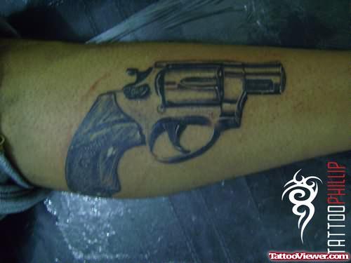 Gun Tattoo On Bicep
