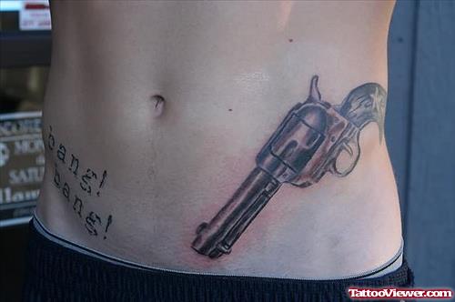 Gun Tattoo On Side Rib