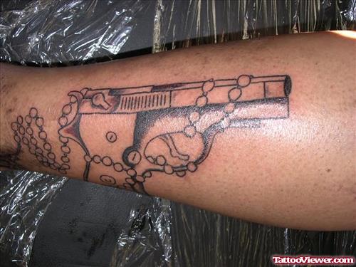 Tattoo Of A Gun