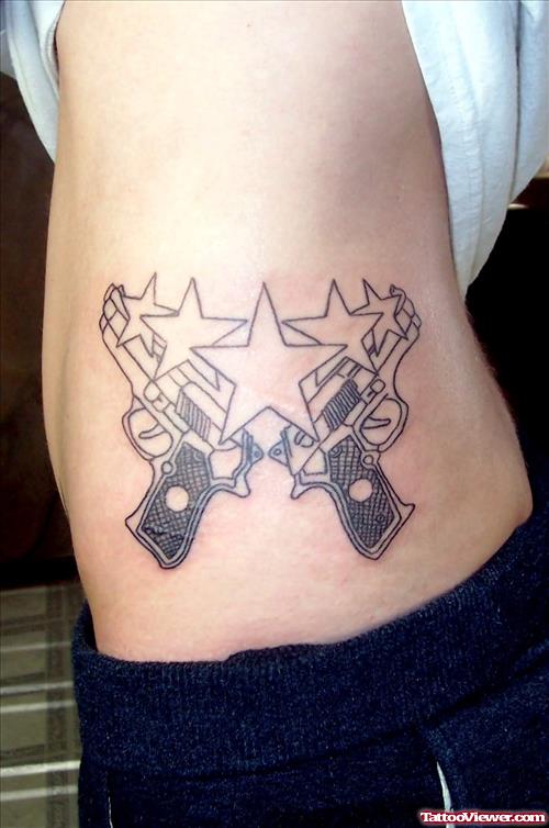 Guns And Stars Tattoos On Rib