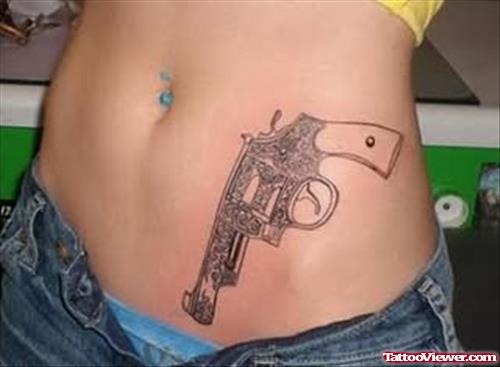 Shooting Gun Tattoo On Belly