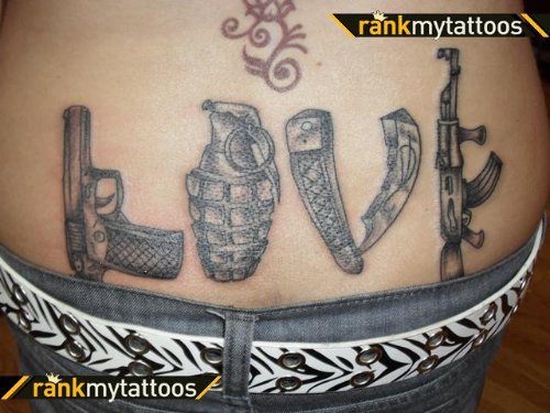 Love Gun Tattoos On Lowerback