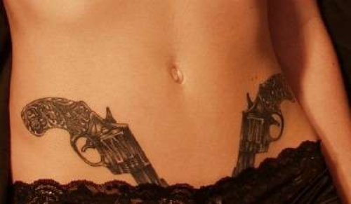 Gun Tattoos On Both Hips