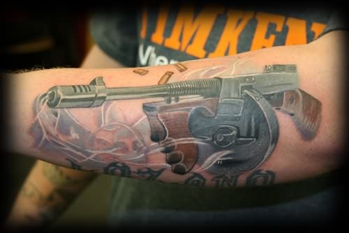 Gun Tattoo On Back Arm