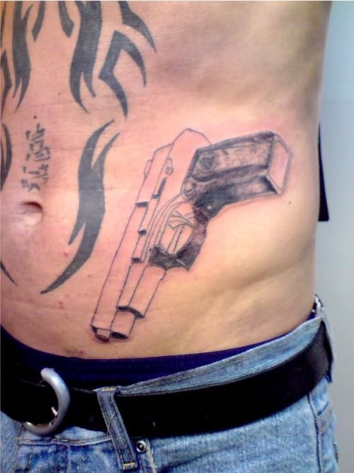 Gun Closer Tattoo On Rib