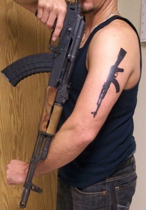 Ak47 Gun Tattoo On Man Left Arm