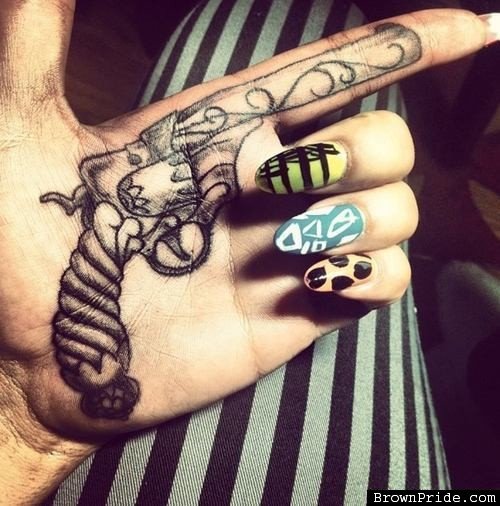 Grey Ink Gun Tattoo On Left Hand