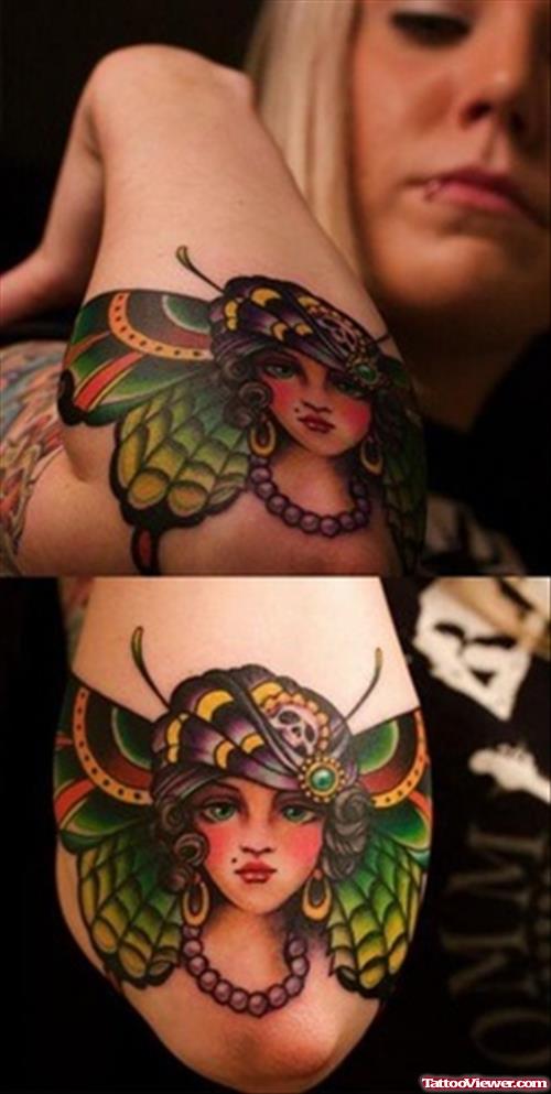 Green Ink Gypsy Head Butterfly Tattoo On Arm