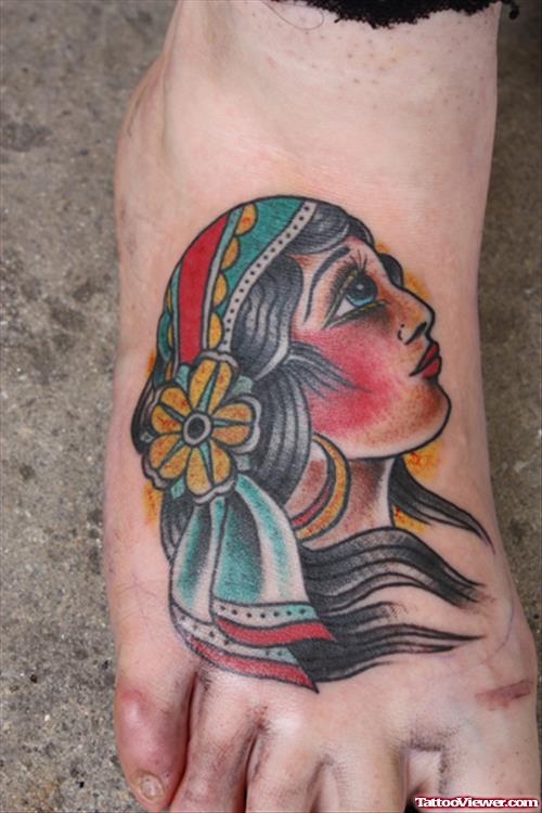 Color Ink Gypsy Head Tattoo On Right Foot