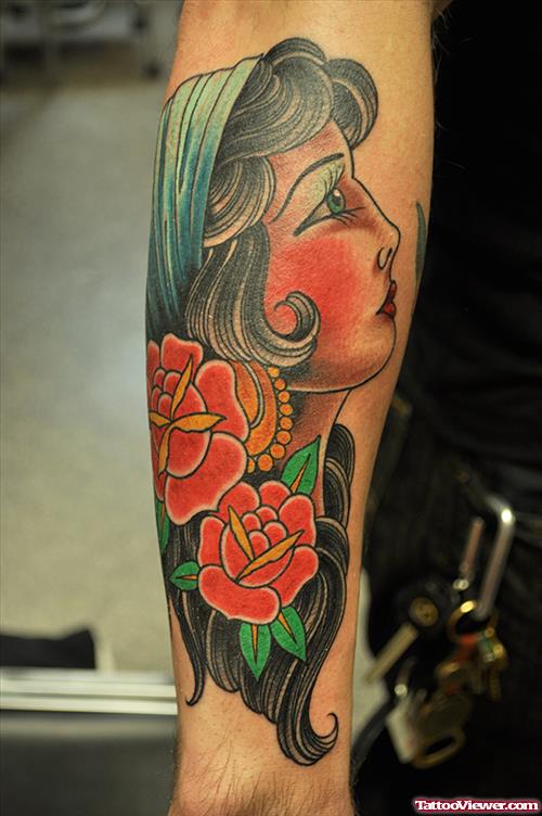Red Flowers And Gypsy Tattoo On Arm