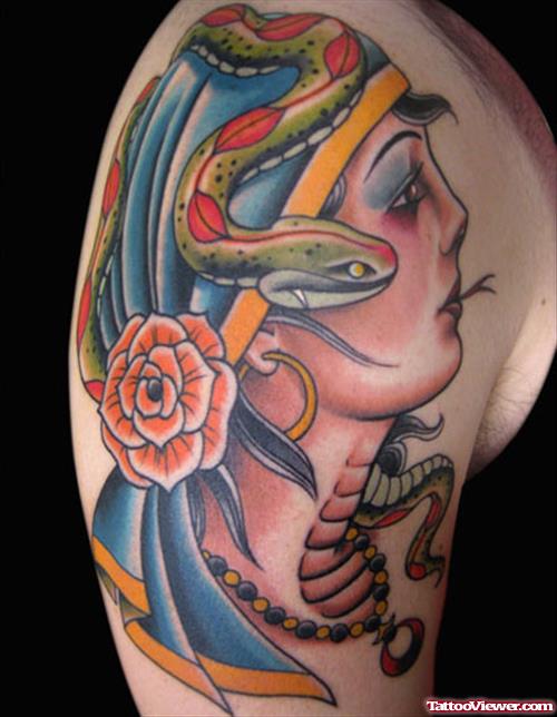 Gypsy With Snake Tongue Tattoo On Right Shoulder