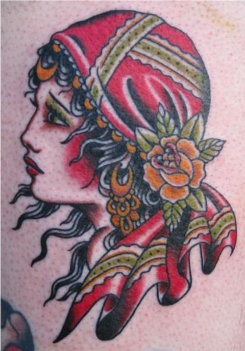 Awesome Red Ink Gypsy Head Tattoo