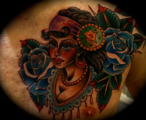 Blue Rose Flowers And Gypsy Tattoo On Chest