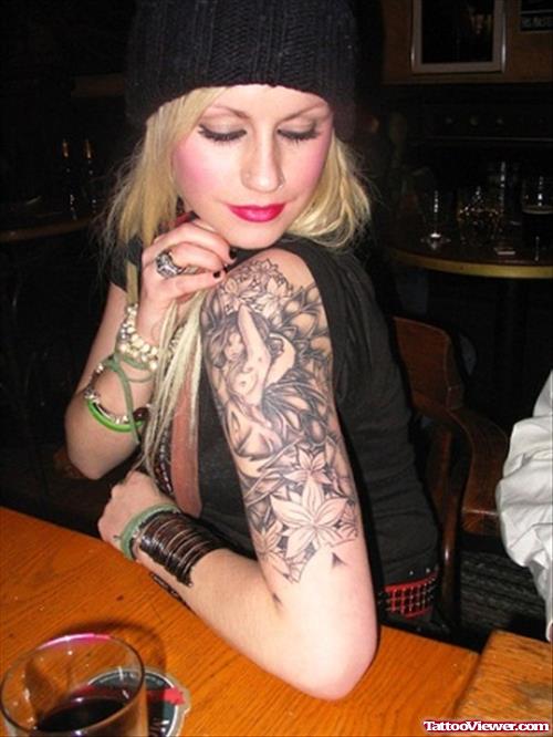 Grey Flowers and Pinup Girl Half Sleeve Tattoo