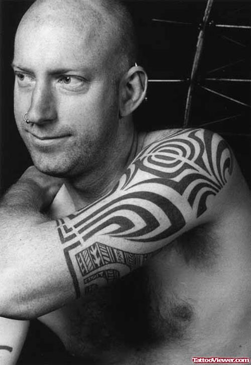 Left Half Sleeve Tribal Tattoo For Men