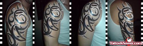 Black Tribal Half Sleeve Tattoo Design For Men