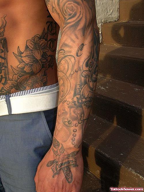 Attractive Man With Left Half Sleeve Tattoo