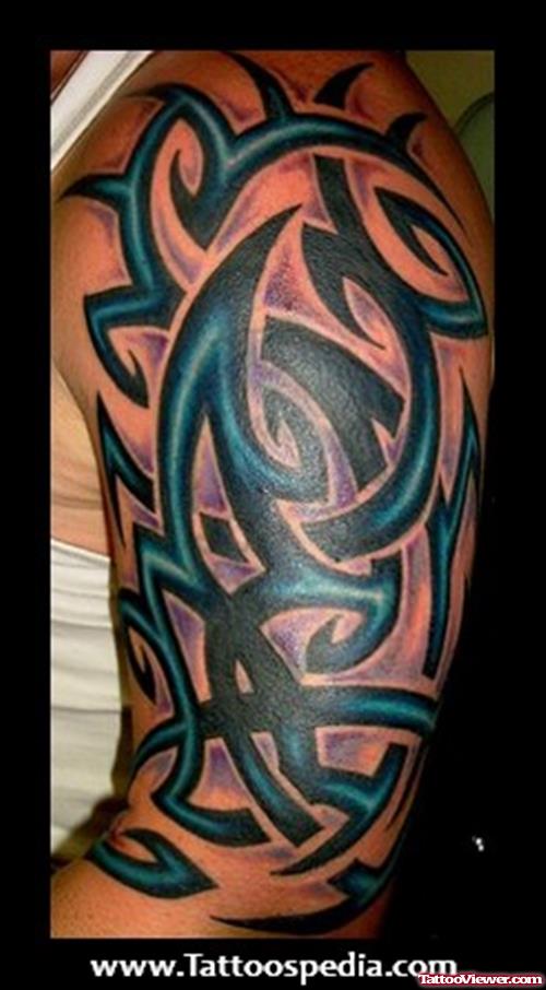 Blue Ink Tribal Half Sleeve Tattoo