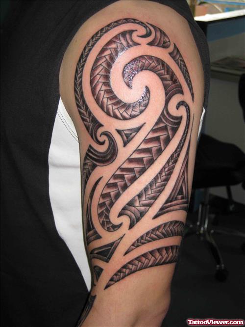 Polynsian Tribal Half Sleeve Tattoo