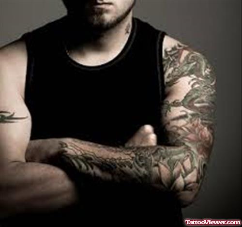 Attractive Man With Half Sleeve Tattoo