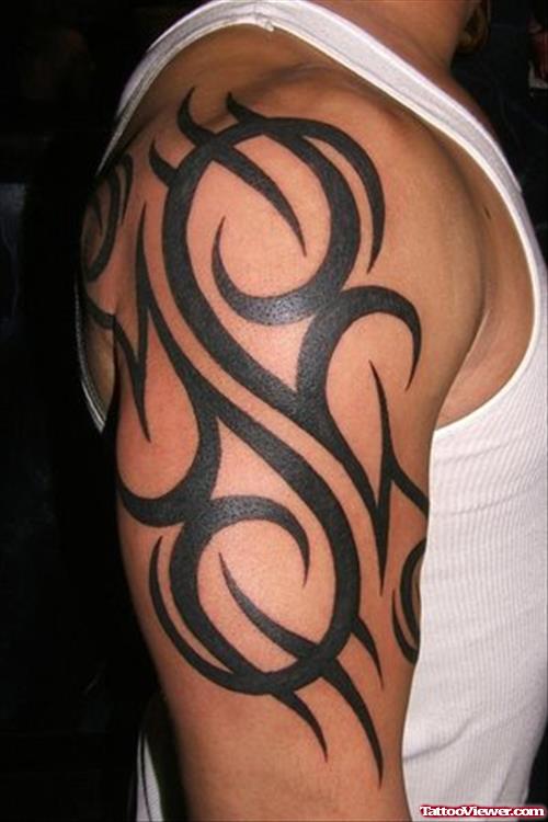 Amazing Black Tribal Half Sleeve Tattoo