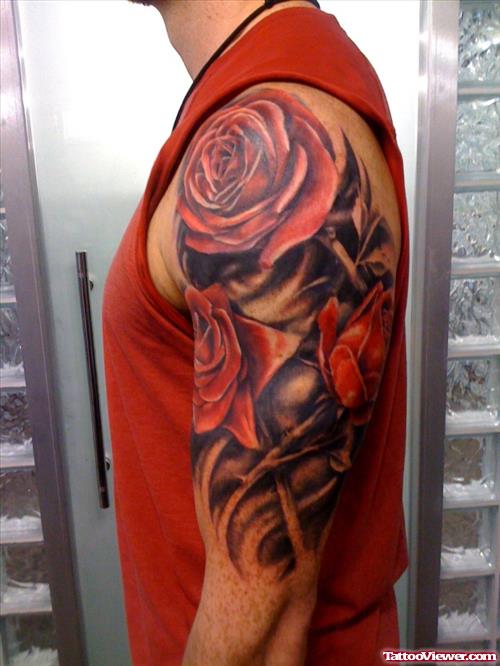 Red Rosers And Tribal Half Sleeve Tattoo